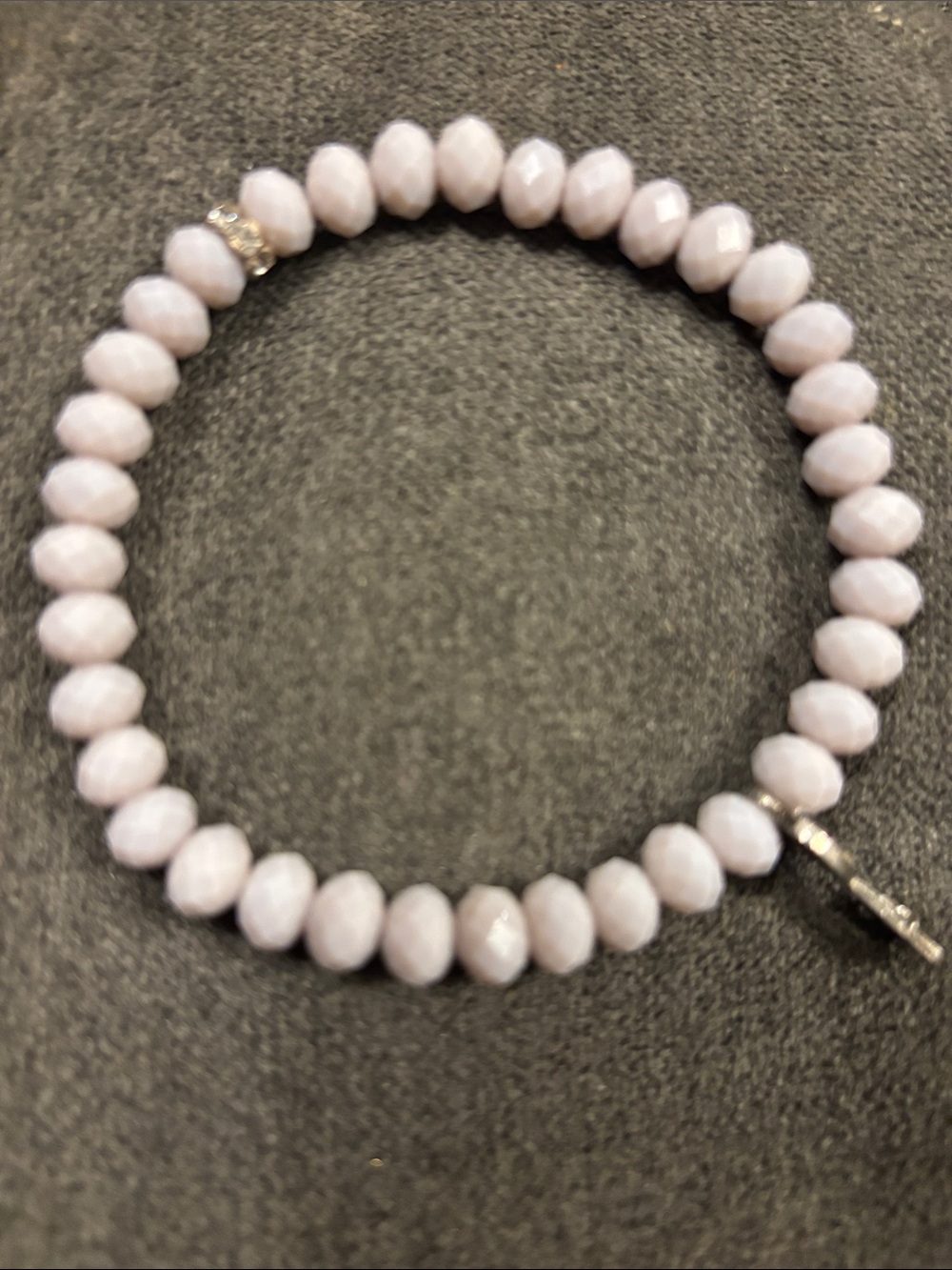 Delicate Pink Beaded Stretch Bracelet with silver tone key with stones on key